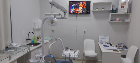 Dra. Romilda Carvalho - Odontologia